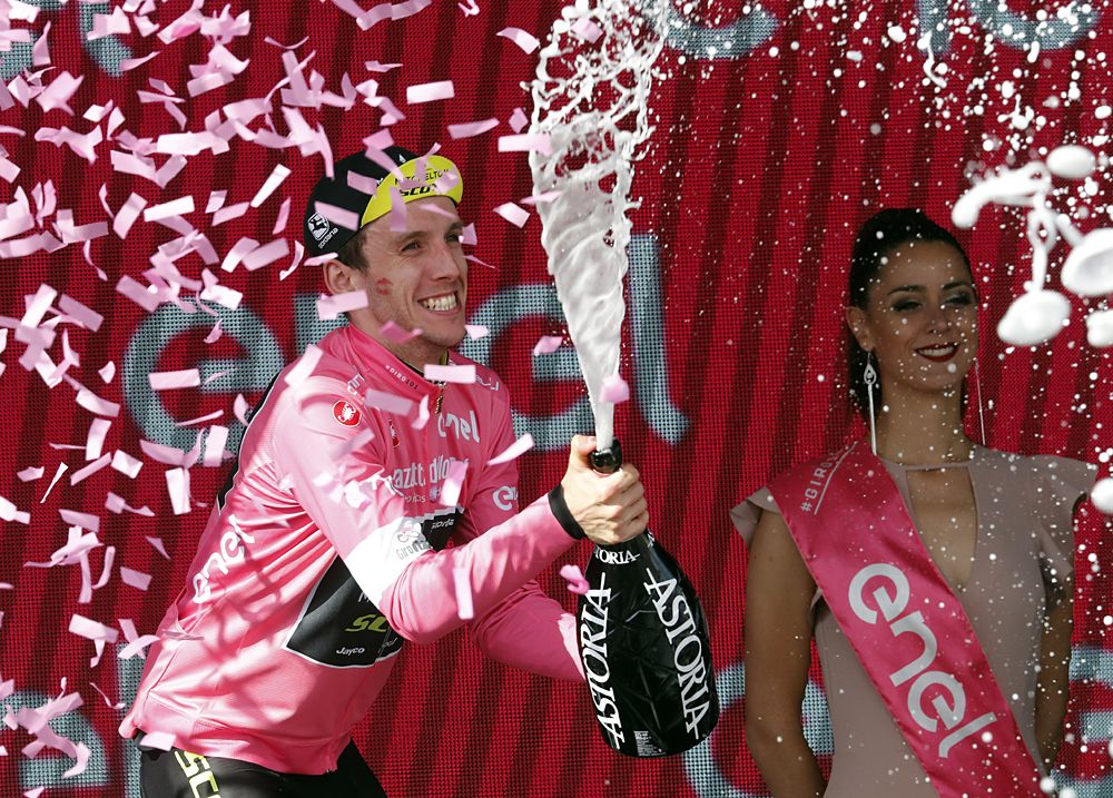 Simon Yates (Mitchelton-Scott) sprays champagne on the podium after stage 18