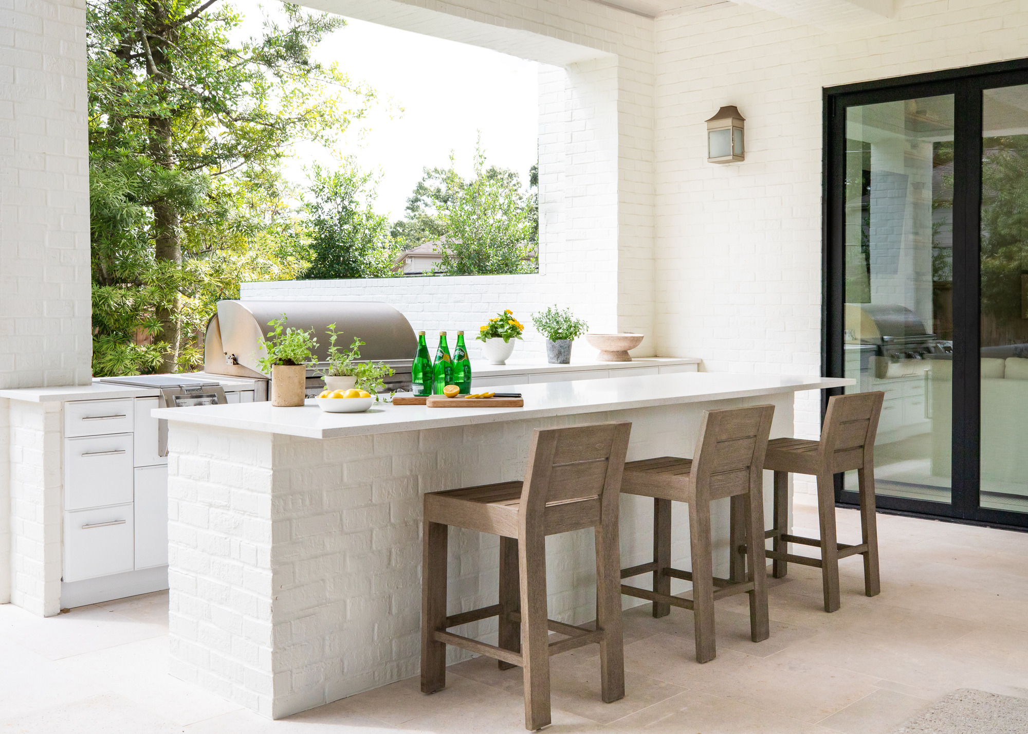 white outdoor kitchen by Marie Flanigan Interiors
