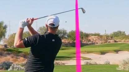 Jon Rahm takes a shot at the match against Bob Does Sports