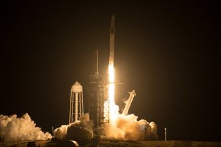 A SpaceX Falcon 9 rocket carrying four astronauts to the International Space Station on the Crew-2 mission lifts off from Pad 39A of NASA's Kennedy Space Center in Cape Canaveral, Florida on April 23, 2021.