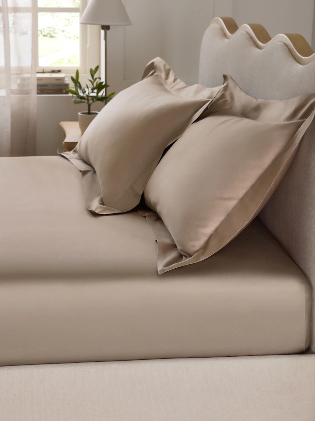 A light brown cotton sateen deep fitted sheet set from Next