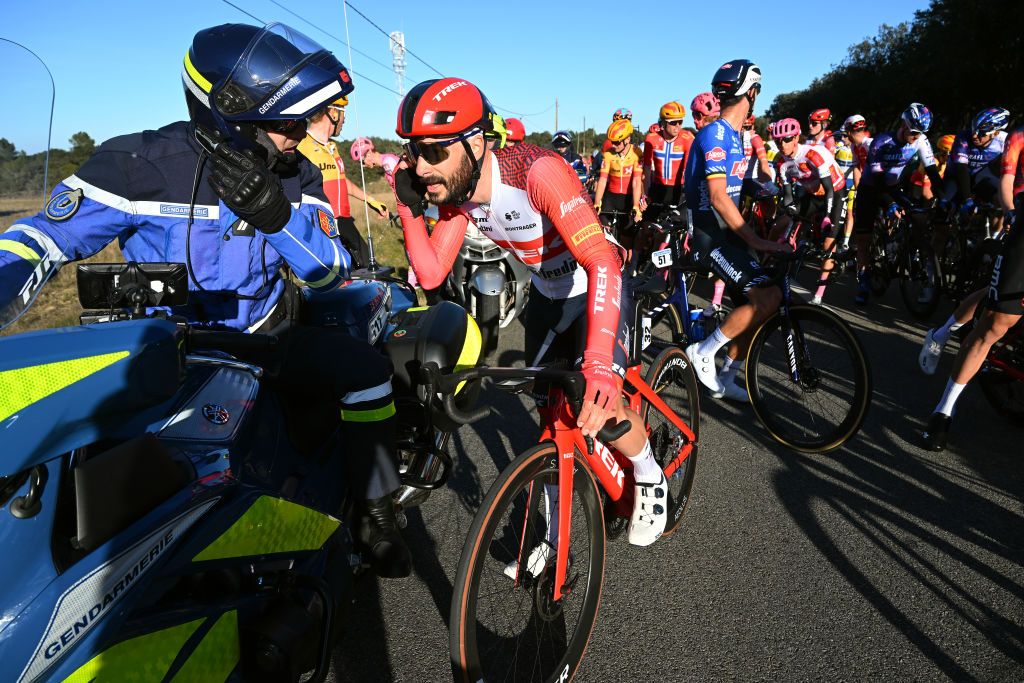 AUBAIS FRANCE FEBRUARY 02 Julien Bernard of France and Team TrekSegafredo talks to a regulator after the neutralization of the stage due to a massive crash during the 53rd Etoile de Besseges Tour Du Gard 2023 Stage 2 a 16963km stage from Bagard to Aubais EDB2021 on February 02 2023 in Aubais France Photo by Luc ClaessenGetty Images