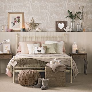 bedroom with cow parsley wallpaper and whilst woodland accessories in bedroom