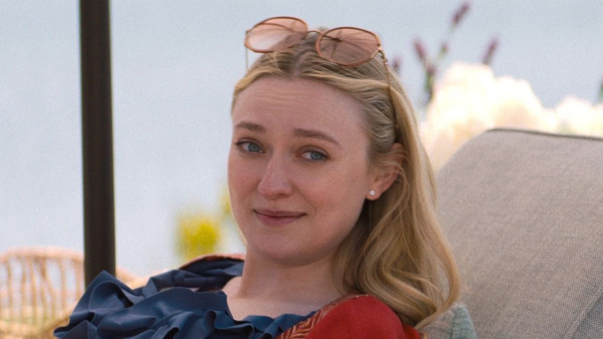 Dakota Fanning lounging in The Perfect Couple