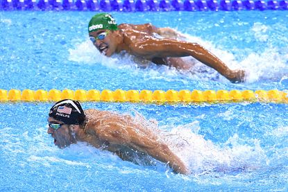 Michael Phelps of Team USA and South Africa's Chad le Clos compete in the 200m butterfly.