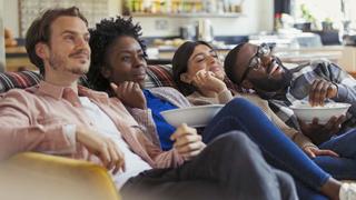 Young adults watching TV