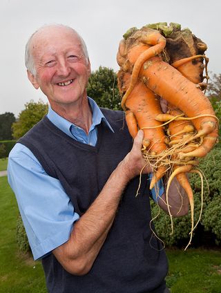 Peter Glazebrook, from Newark in Nottinghamshire, with a 20lb carrot