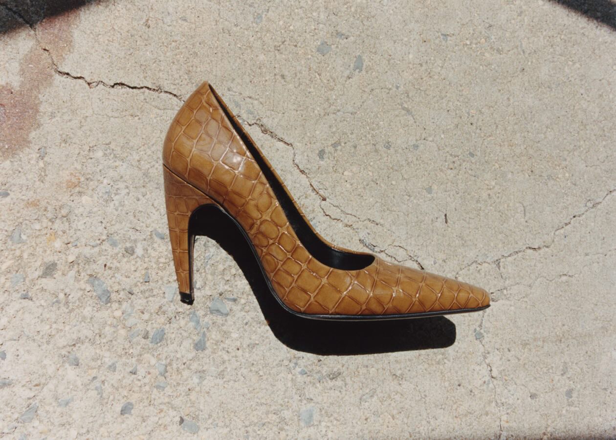 An image of @christietyler wearing the mock croc trend, one of the biggest animal print trends of 2026.