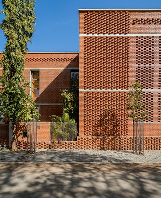 exterior brickwork at An Urban House by MISA Architects