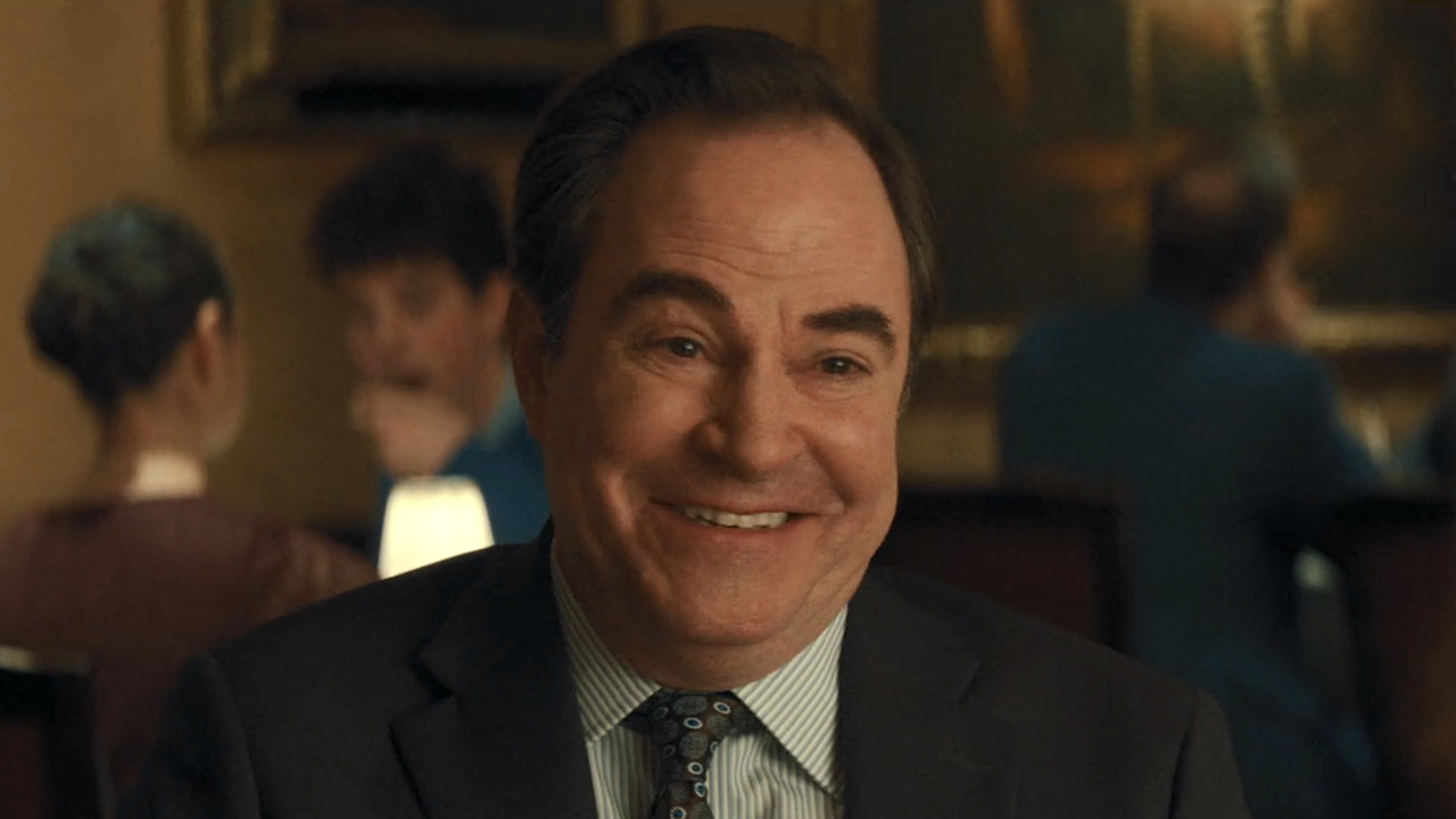 Roger Bart smiling in Office Romance.