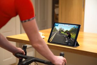 Image shows a rider cycling on Zwift