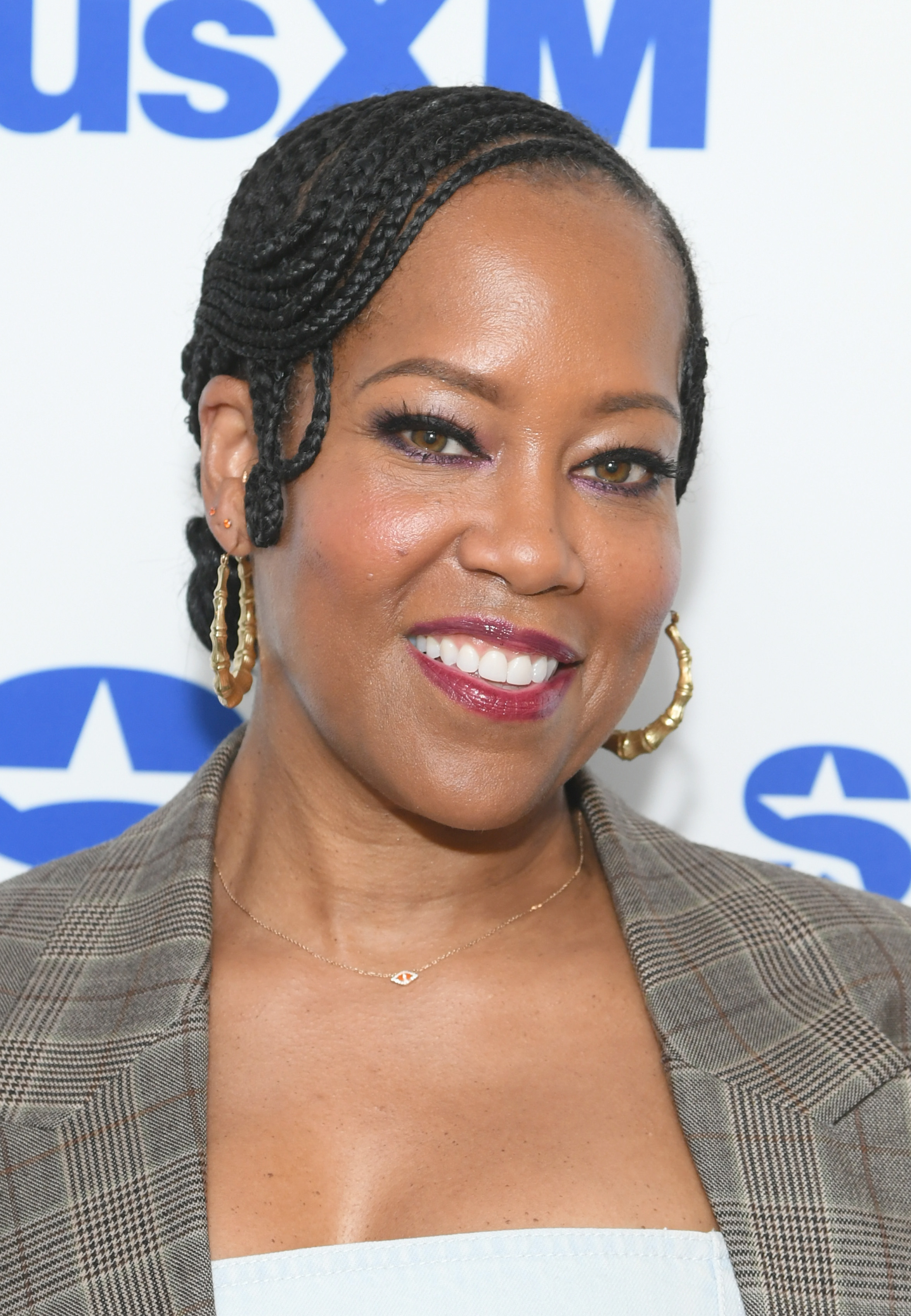 Regina King wearing the cornrow hairstyle earlier in the day.