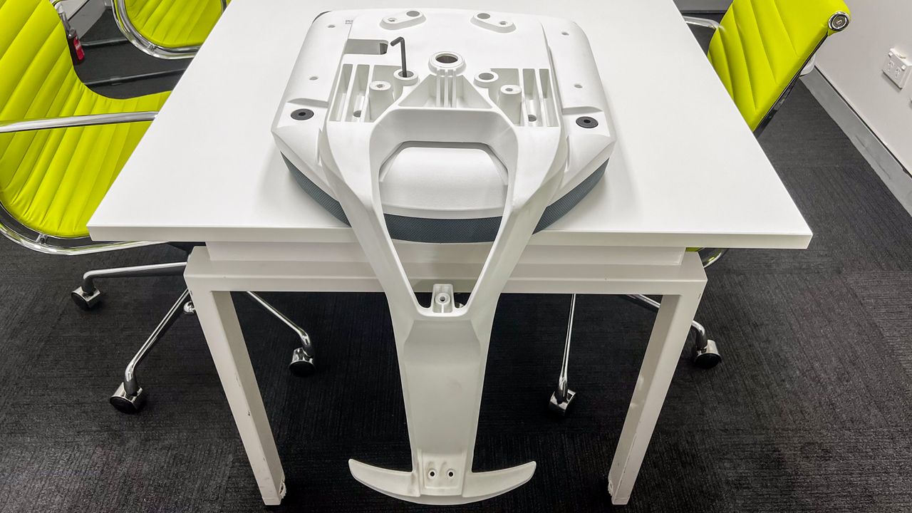 Desky Swivel 3D Tilt office chair being assembled on a table