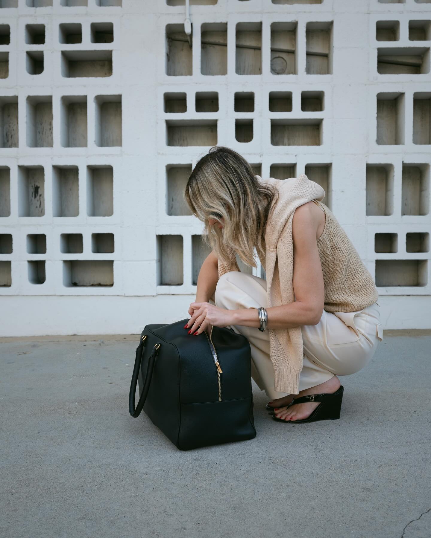 Influencer wearing wedge-heel flip-flops