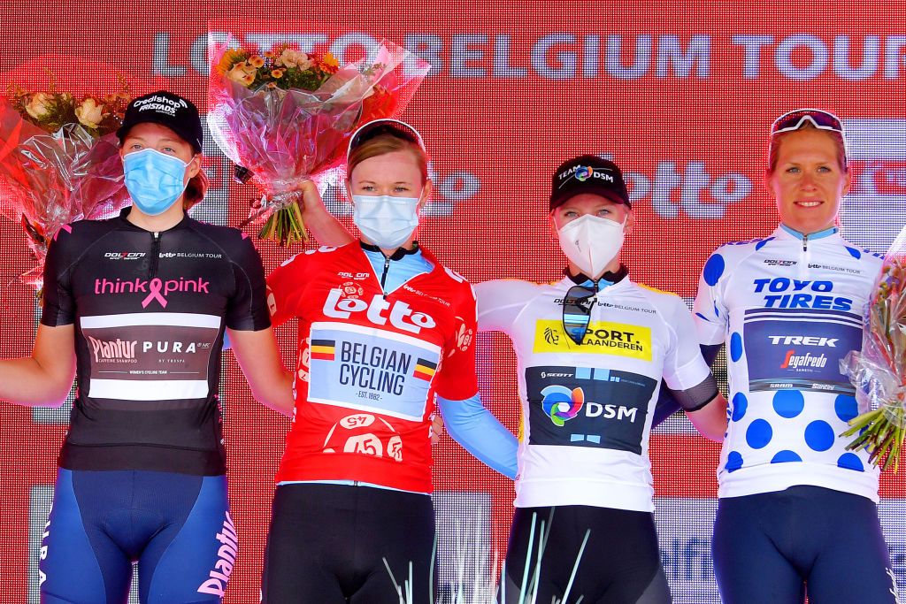 BRUGGE BELGIUM JUNE 23 Julie De Wilde of Belgium and Team PlanturPura Black Queen of the Stones Jersey Jolien Dhoore of Belgium and Belgium National Team Red Leader Jersey Lorena Wiebes of The Netherlands and Team DSM white best young jersey Ellen Van Dijk of The Netherlands and Team Trek Segafredo Polka Dot Mountain Jersey celebrates at podium during the 9th Lotto Belgium Tour 2021 Stage 1 a 1126km stage from Blankenberge to Bruges LottoBelgTour LottoBelgiumTour on June 23 2021 in Brugge Belgium Photo by Luc ClaessenGetty Images
