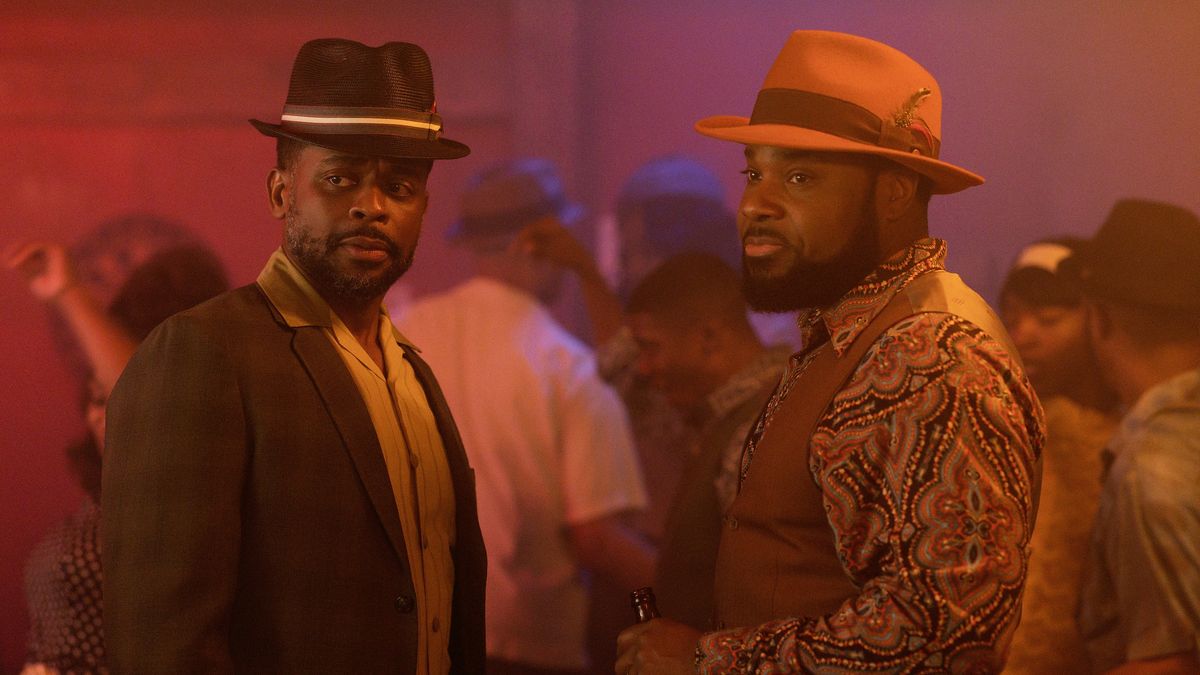 Dulé Hill and Malcolm-Jamal Warner standing at a party in The Wonder Years season 2