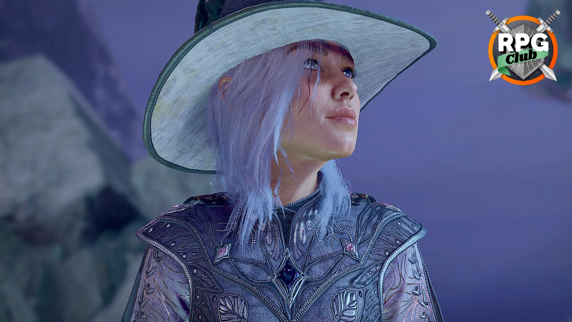A sorcerer character in Baldur's Gate 3 looking to the left and smiling