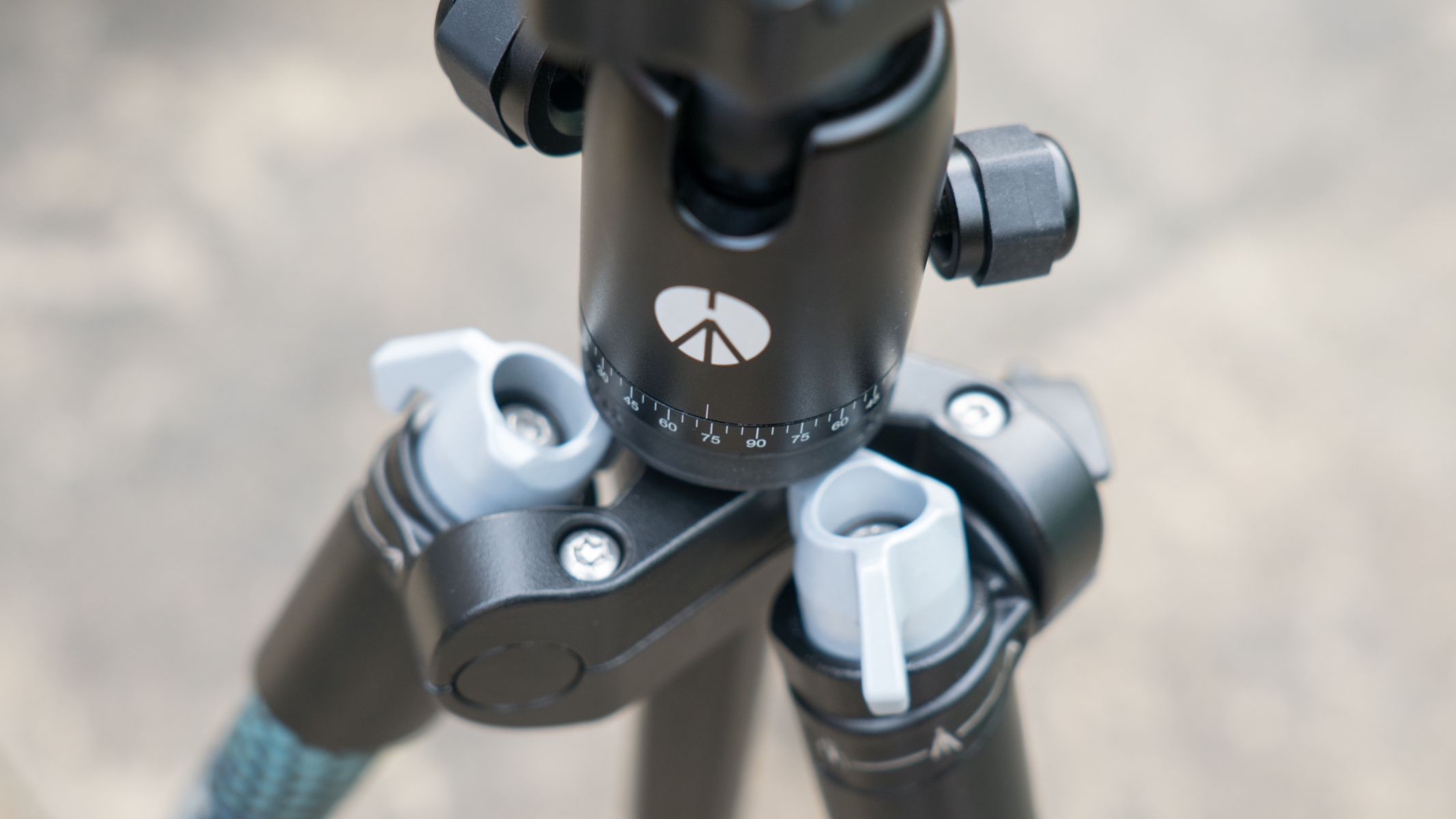 A close up view of the locking levers on the tripod legs