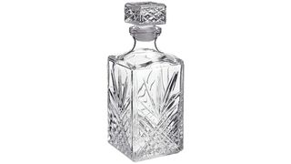 An etched clear crystal decanter.