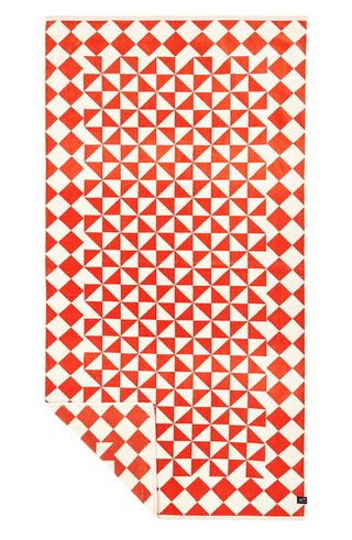 an orange and white graphic printed beach towel