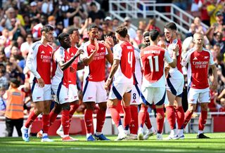 Arsenal squad for 2024/25 LONDON, ENGLAND - AUGUST 11: William Saliba of Arsenal celebrates scoring his teams first goal with teammates during the Pre-Season Friendly match between Arsenal FC and Olympique Lyonnais at Emirates Stadium on August 11, 2024 in London, England. (Photo by David Price/Arsenal FC via Getty Images)