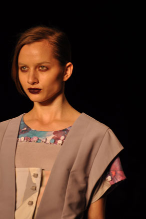Nude eyes and blood-stained lips create a vampire look at Erika Ikezili.