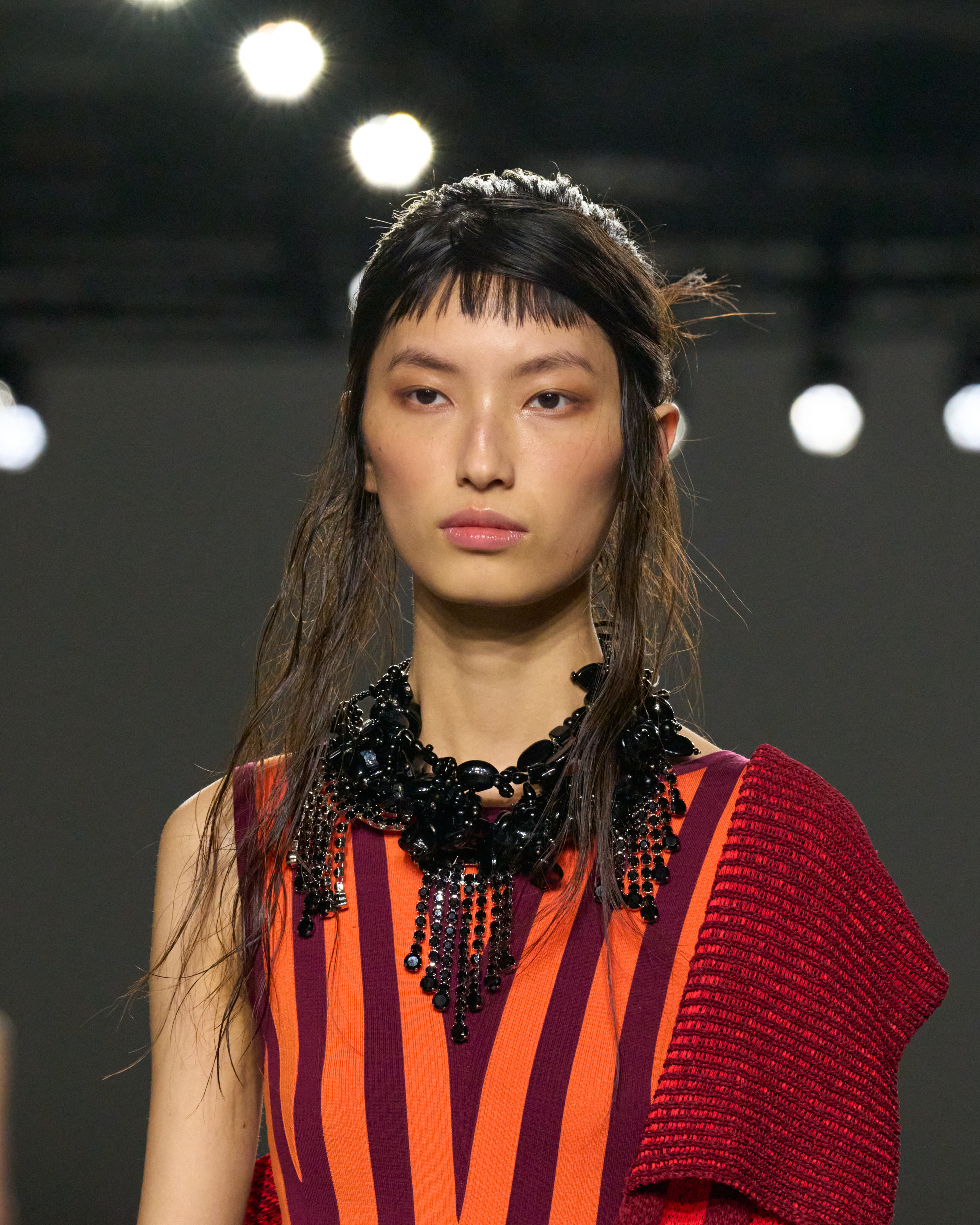 A model at the spring/summer 2026 Dries Van Noten show wearing a statement necklace.