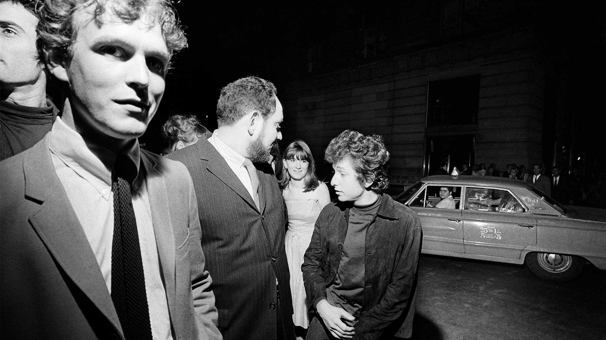 Bob Dylan on his way to visit the Beatles at the Delmonico Hotel on Park Avenue in New York City where the band stayed during their visit, from August 28th-29th, 1964, while on their North American Tour ahead of their concert to be held at Forest Hills.