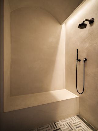 A bathroom with recessed lighting