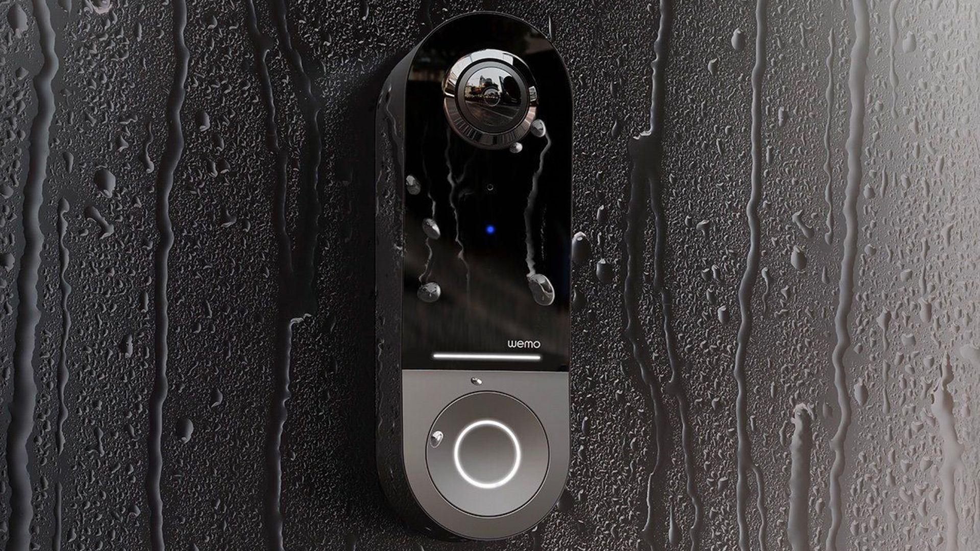 Wemo Smart Doorbell Mounted on Dark Wood Door