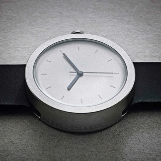 Designer Matthew Hilton has launched his first-ever watch at the Margaret Howell store on Wigmore Street. The pared-back timepiece has a bead blasted stainless steel casing and an Italian aniline calf leather strap by Bill Amberg. The weighty design combines the case and face in a single component