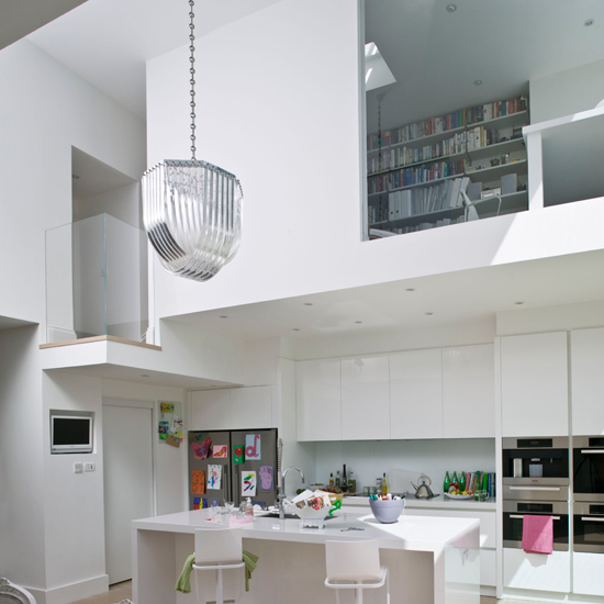 White walls with white door and chairs