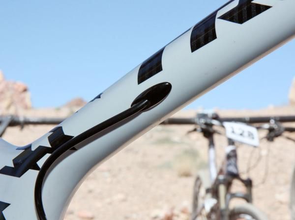 Removable bolt-on aluminum stops at all of the exit points allow for a bigger target when feeding the lines through the frame - similar to what Trek also does on the road-going Madone.