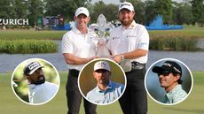 Rory McIlroy and Shane Lowry hold a trophy