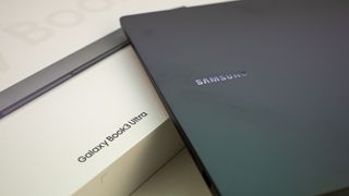 A closed Samsung Galaxy Book 3 Ultra on top of its box
