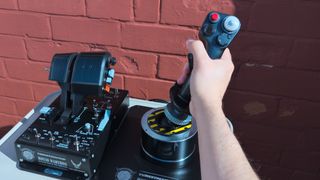 Thrustmaster HOTAS WARTHOG MK II flight stick held in hand