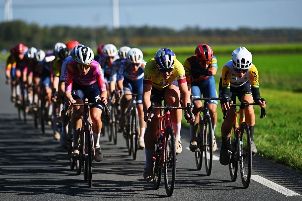 ZEEWOLDE NETHERLANDS OCTOBER 10 LR Christine Majerus of Luxembourg and Team SD Worx Protime Zoe Backstedt of The United Kingdom and Team CanyonSRAM Racing Yellow leader jersey and Ruby RosemanGannon of Australia and Team Liv AlUla Jayco compete during the 26th Simac Ladies Tour 2024 Stage 3 a 1484km stage from Zeewolde to Zeewolde UCIWWT on October 10 2024 in Zeewolde Netherlands Photo by Luc ClaessenGetty Images