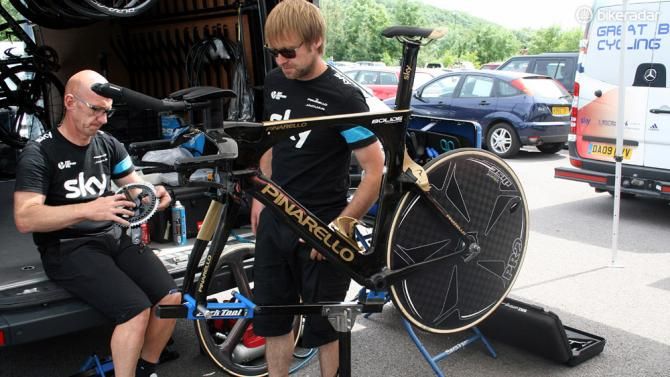 Team Sky mechanics worked hard all afternoon to prep Wiggins' race bike