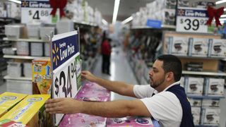 Walmart employee preparing for Black Friday