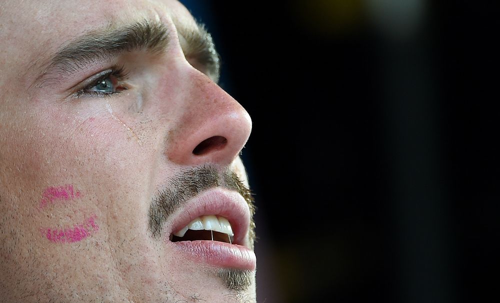 John Degenkolb sheds tears of joy on the Milan-San Remo podium.