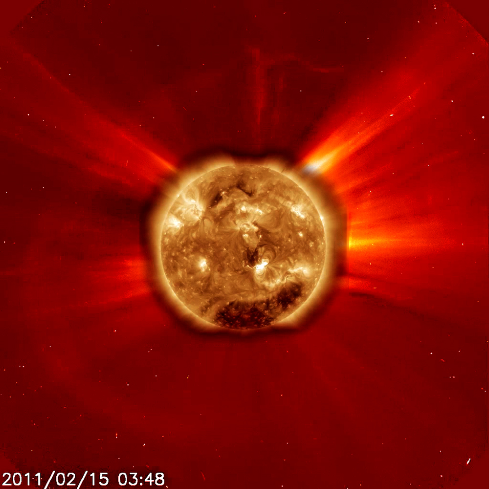 The image of the powerful Class X2 solar flare of Feb. 14, 2011, shows how it appeared to both the Solar Dynamics Observatory in extreme ultraviolet light (center sun disk) and the SOHO&#039;s C2 coronagraph. This was the largest flar