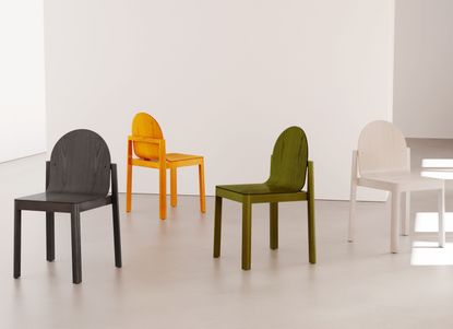 Cleo wooden chairs by Stine Aas for Dims, in new colours including black, orange, green and white