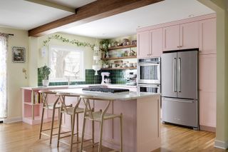 pink kitchen with green walls