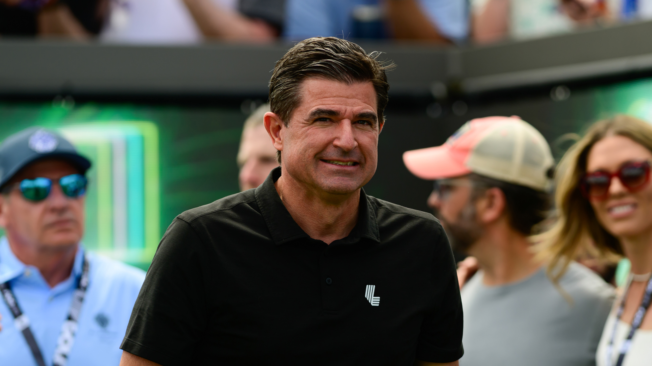 LIV Golf CEO Scott O'Neil smiles during the 2025 LIV Golf Team Championship