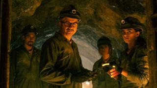 Damian Keila, Cameron and Bruce in the catacombs in Money Heist: Berlin episode 1