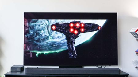 Samsung S90D OLED TV on table in living room