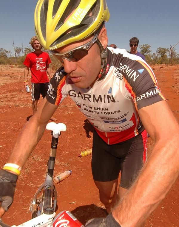 Jure Robic takes on water.