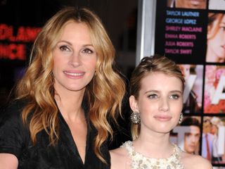 Julia Roberts and Emma Roberts stand together at the Valentine's Day premiere