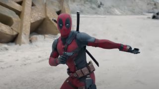 A costumed Wade Wilson stylishly reloads his pistols in Deadpool 3