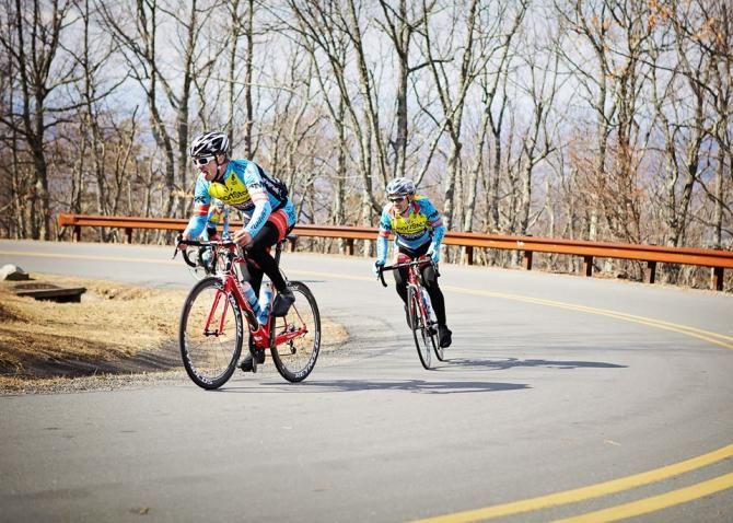 Isaac Howe leads Chris Monteleone up Pilot Mountain during the Team SmartStop p/b Mountain Khakis pre-season camp.